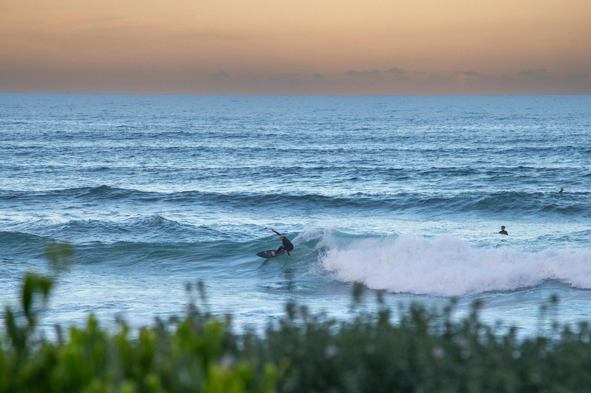 Sydney beaches - Cronulla Beach coastline stretching south with surf and sand