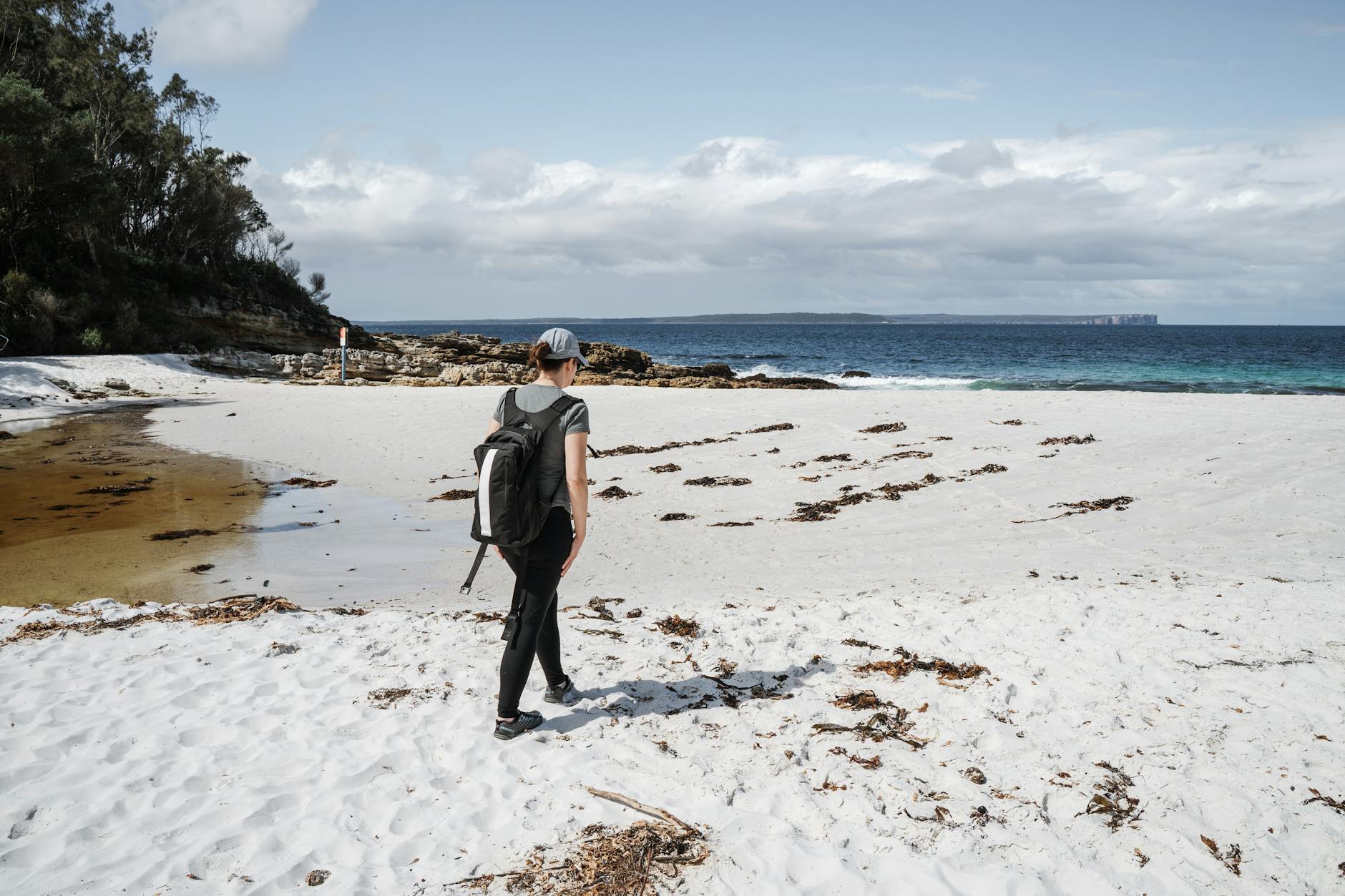 Day trips from Sydney - Pristine white sand beach and crystal clear waters at Jervis Bay, a stunning day trip from Sydney.