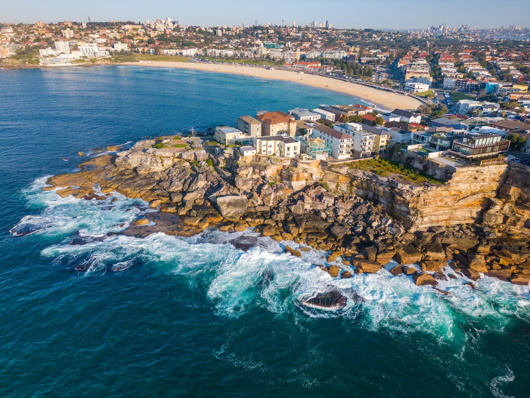 Bondi Beach Sydney aerial view of golden sand and surfers