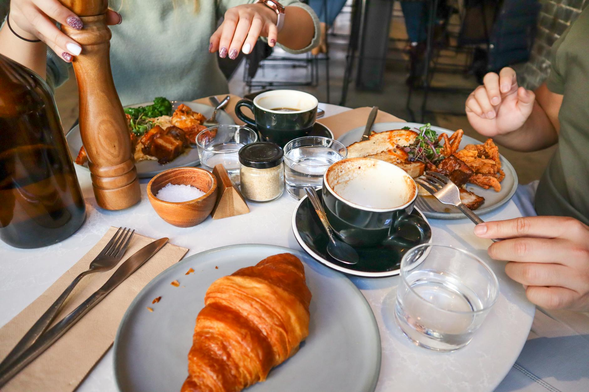 Best restaurants in Sydney - stylish cafe interior with fresh brunch dishes and specialty coffee