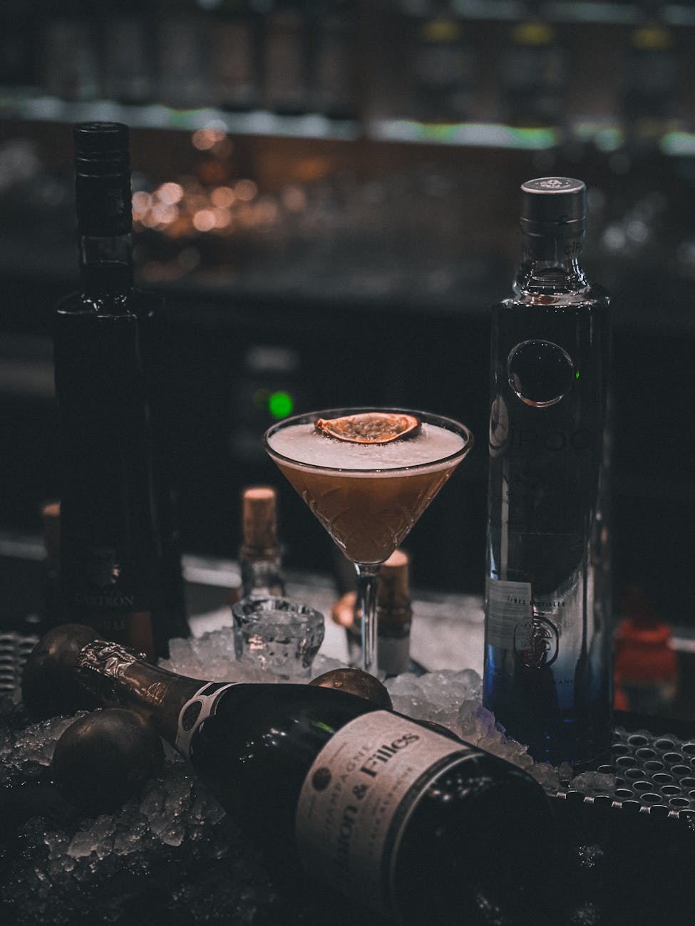 Moody speakeasy cocktail bar with dim lighting and craft drinks