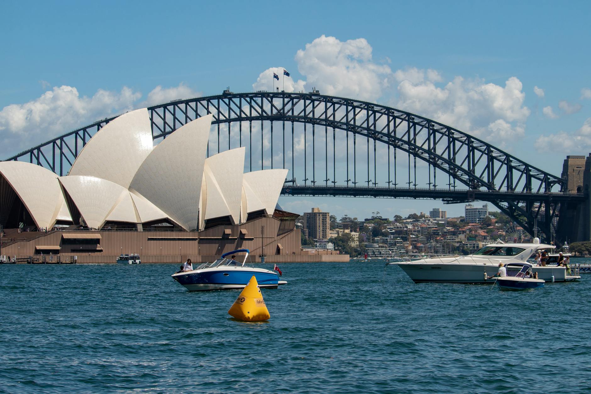 Sydney Harbour cruise boat passing the Opera House