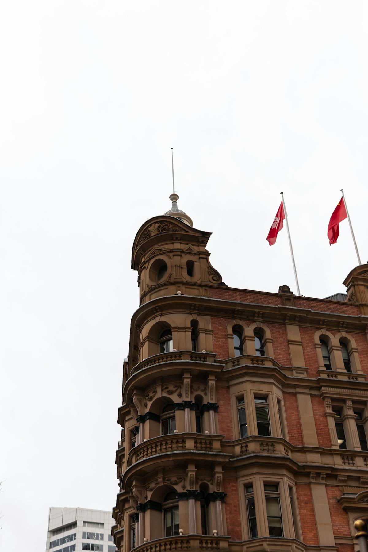 Historic heritage building with flags in Sydney CBD