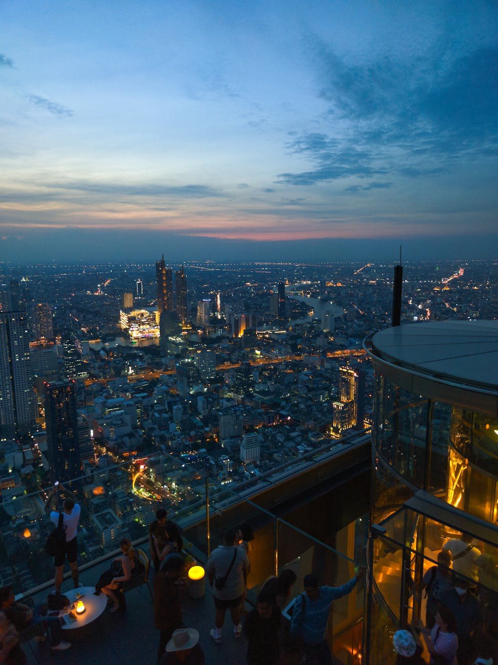 Rooftop bar with city skyline views at night