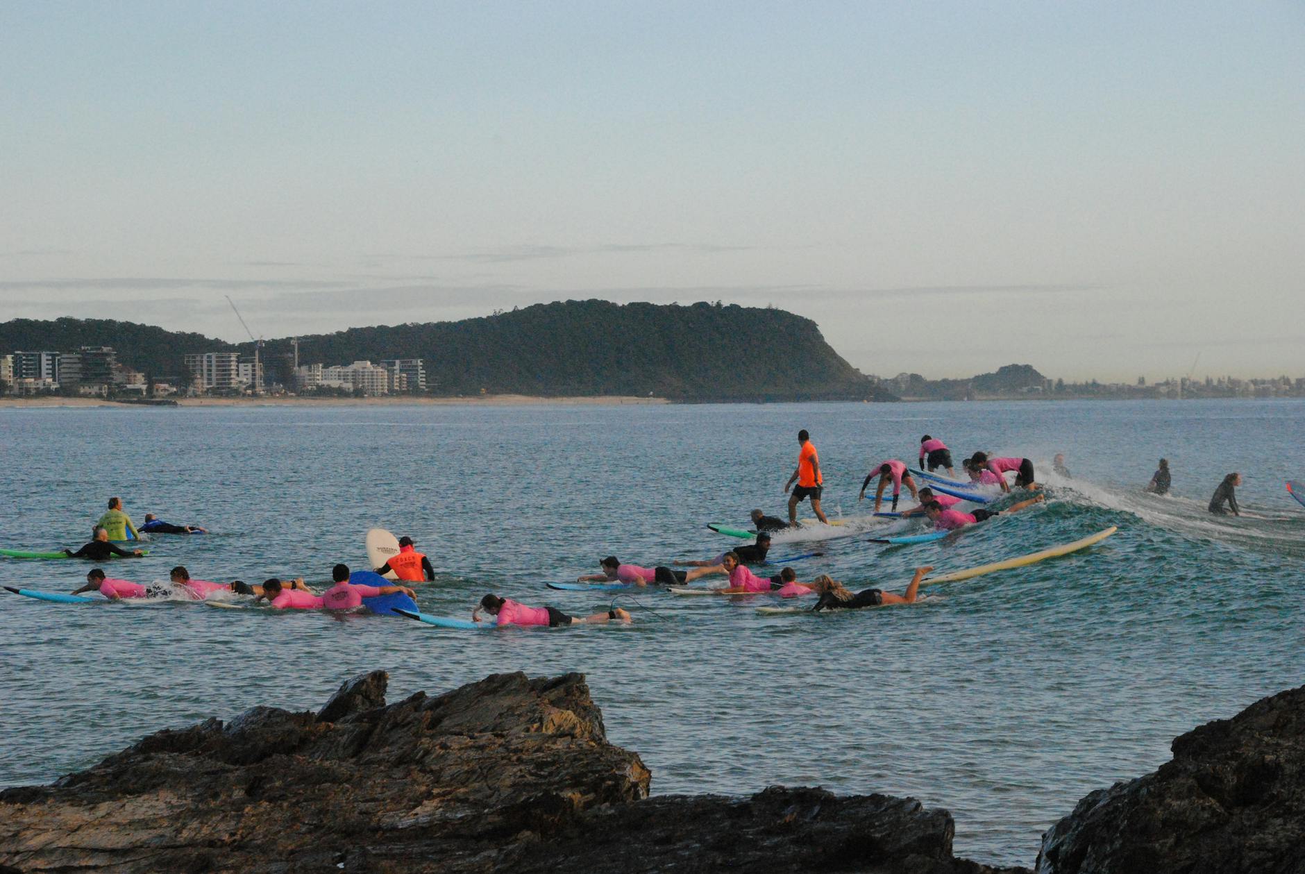 Surfing in Sydney - surf school lesson on beach with instructor