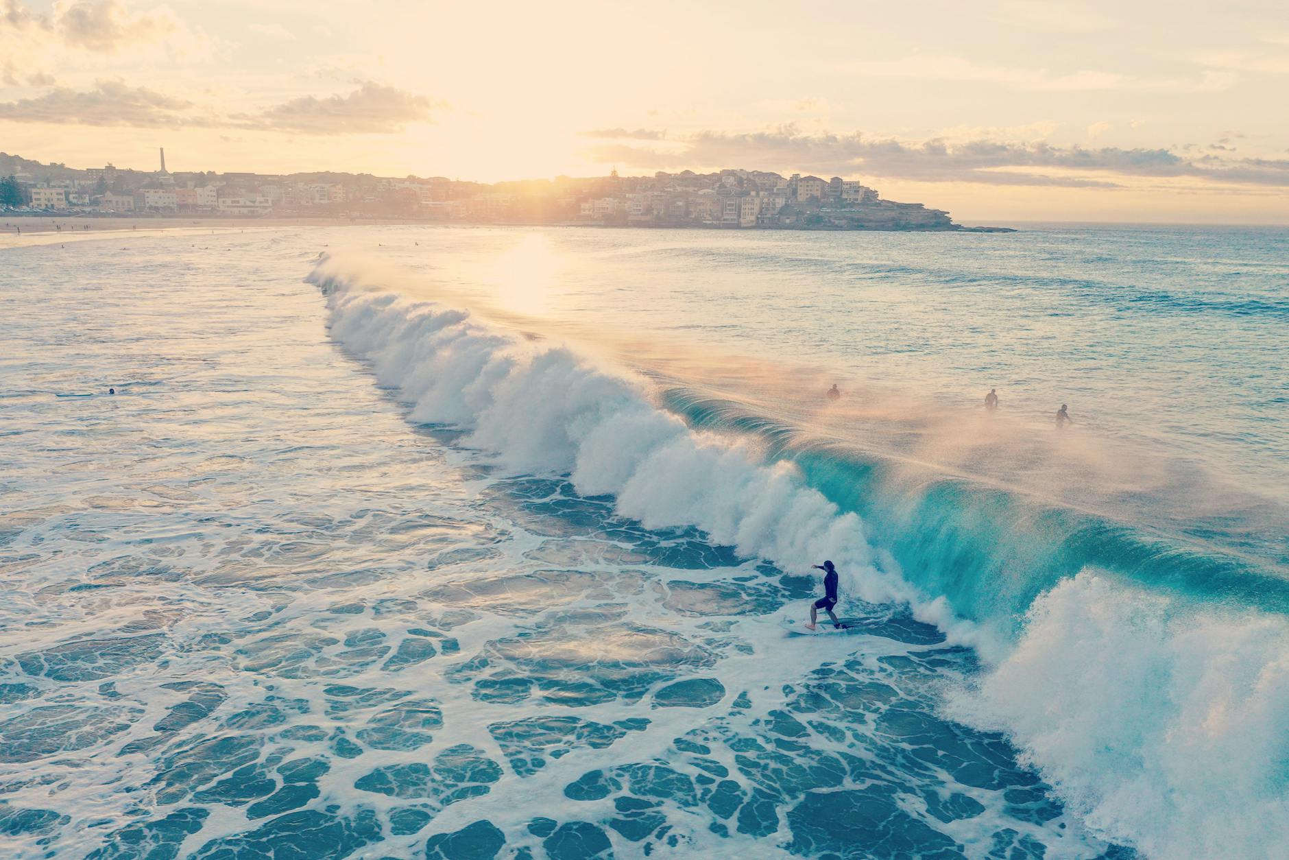Where to stay in Bondi Beach - surfer riding wave