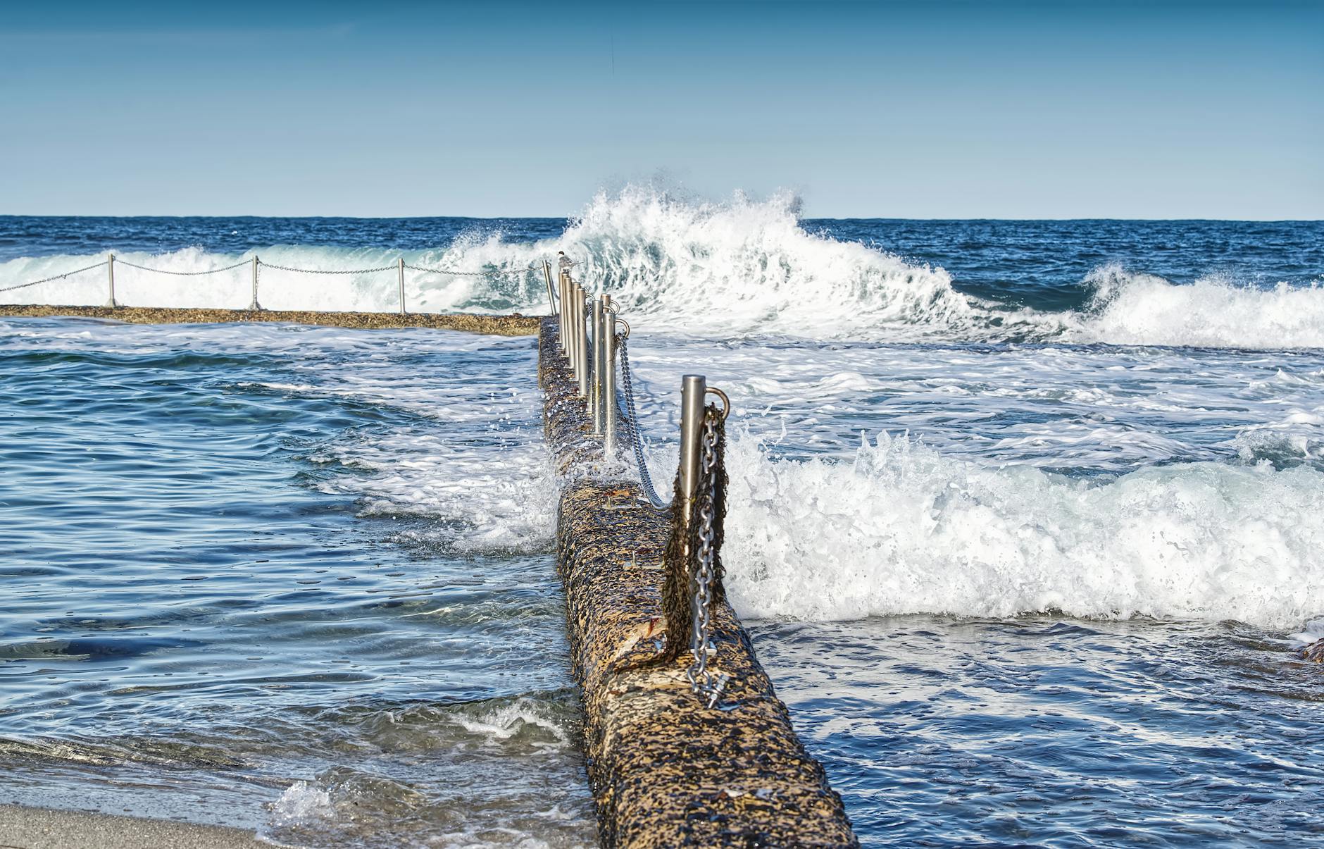Sydney ocean pools - rock pool with crashing waves