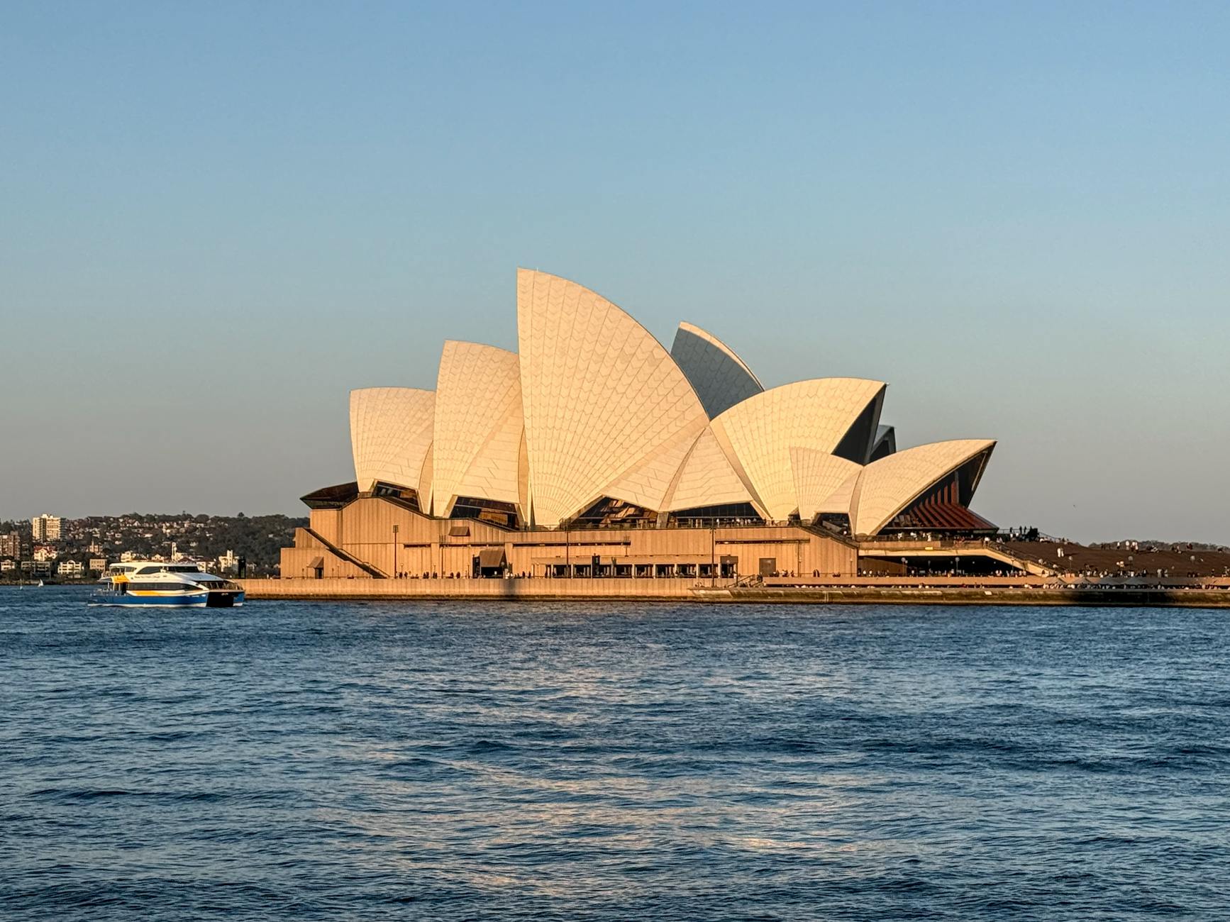 Best Time To Visit Sydney - Best time to visit Sydney - blue summer sky over Sydney Opera House and harbour