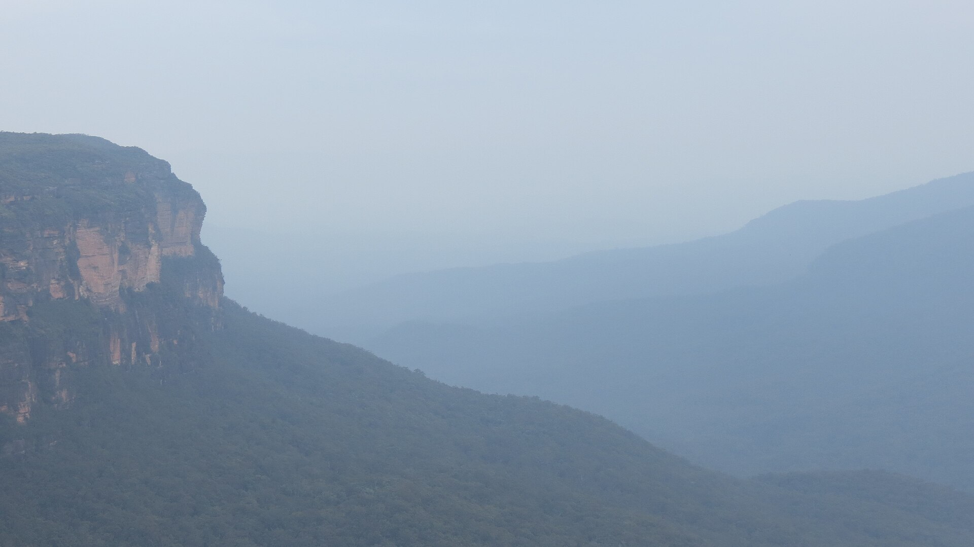 Blue haze over the Jamison Valley escarpment seen from a Wentworth Falls lookout